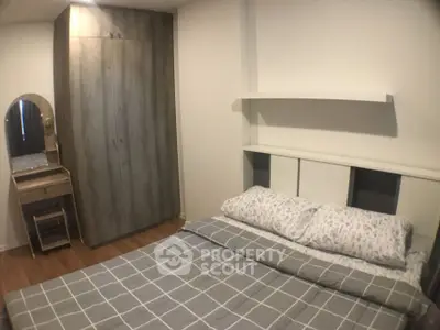 Cozy bedroom with modern wardrobe and stylish decor