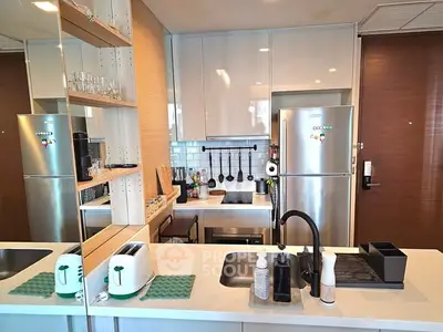 Modern kitchen with sleek appliances and stylish decor