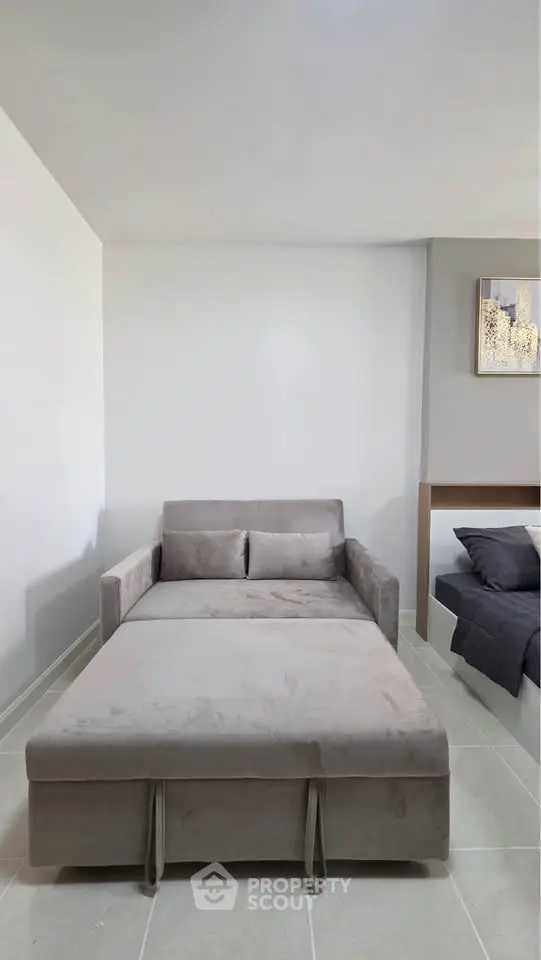 Modern living room with stylish sofa bed and minimalist decor