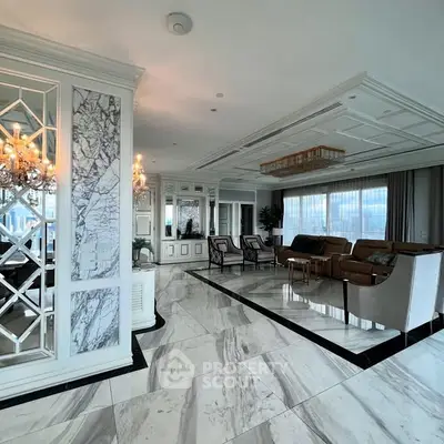 Luxurious living room with marble flooring and elegant decor