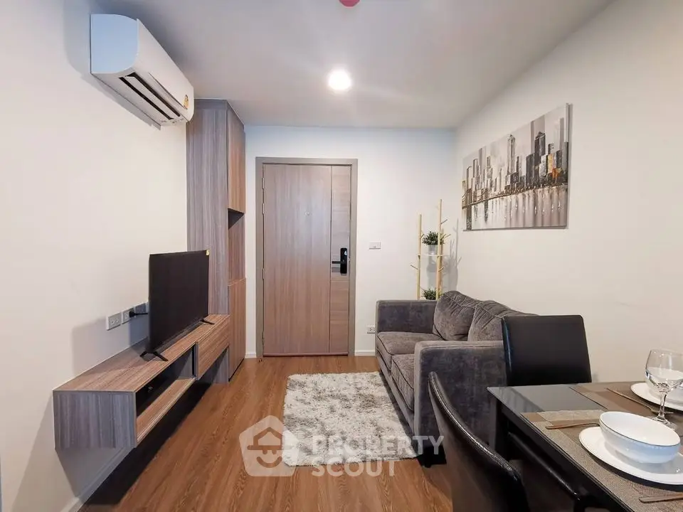 Modern living room with stylish furniture and wall art in a cozy apartment