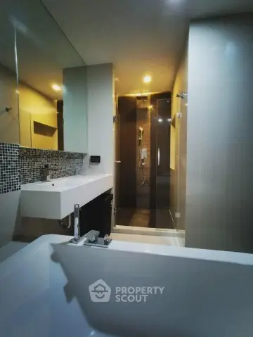 Modern bathroom with sleek design and spacious shower area