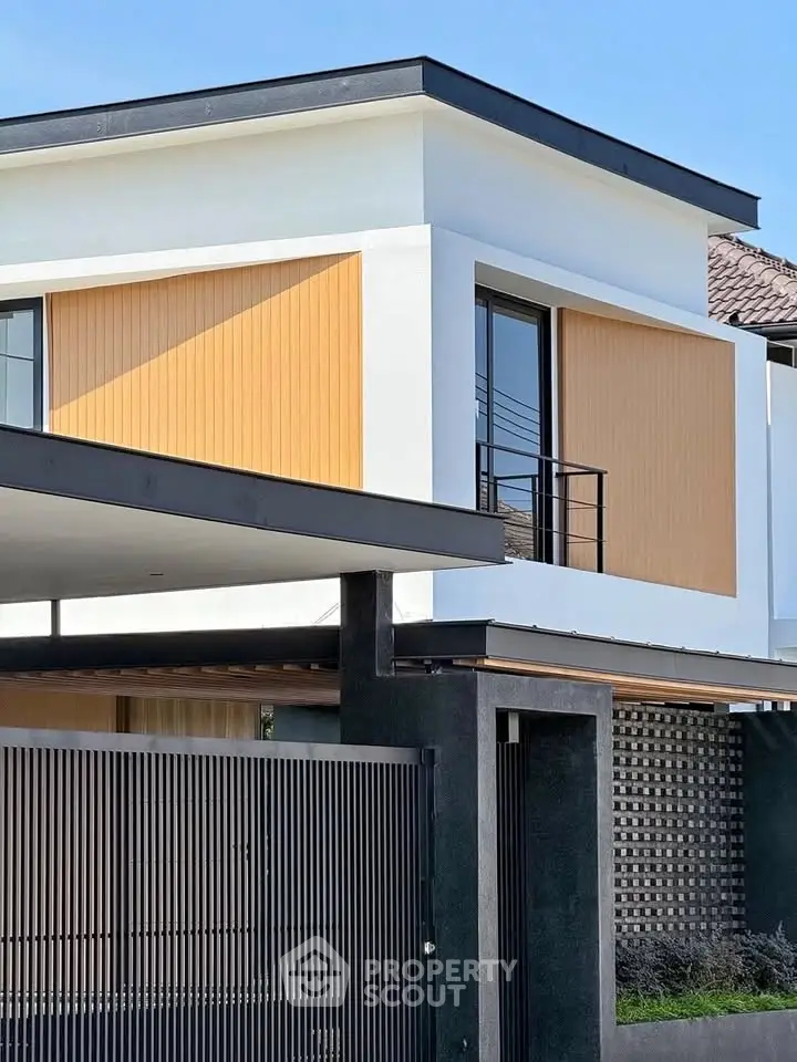 Modern architectural home exterior with sleek design and large windows