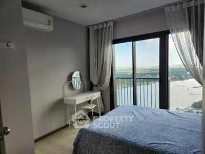 Stunning bedroom with river view and elegant decor in modern apartment