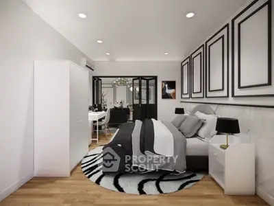 Modern bedroom with stylish decor and cozy ambiance, featuring elegant lighting and contemporary furnishings.