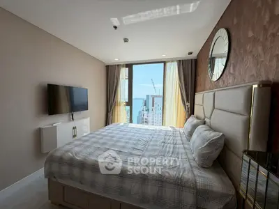 Luxurious bedroom with stunning city view and modern decor