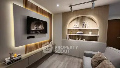 Modern living room with stylish wall decor and cozy lighting