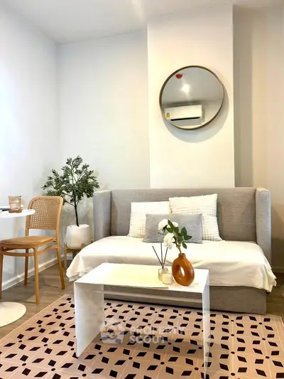 Chic modern living room with stylish sofa, elegant decor, and cozy ambiance, perfect for urban living.