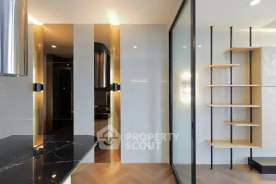 Modern interior with sleek design, featuring a stylish open layout and elegant lighting.