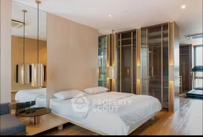 Luxurious modern bedroom with elegant wooden accents and ambient lighting