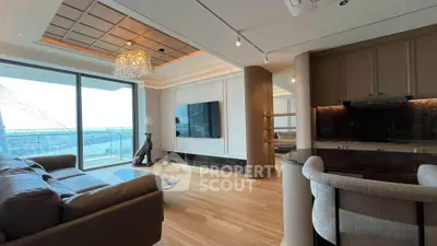 Luxurious living room with modern decor and stunning balcony view