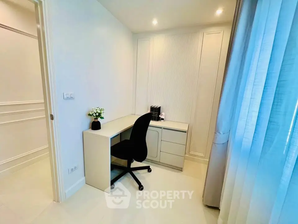 Modern study room with sleek desk and chair, ideal for productivity and comfort.