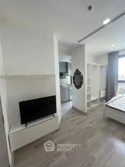 Modern studio apartment with sleek design and natural light