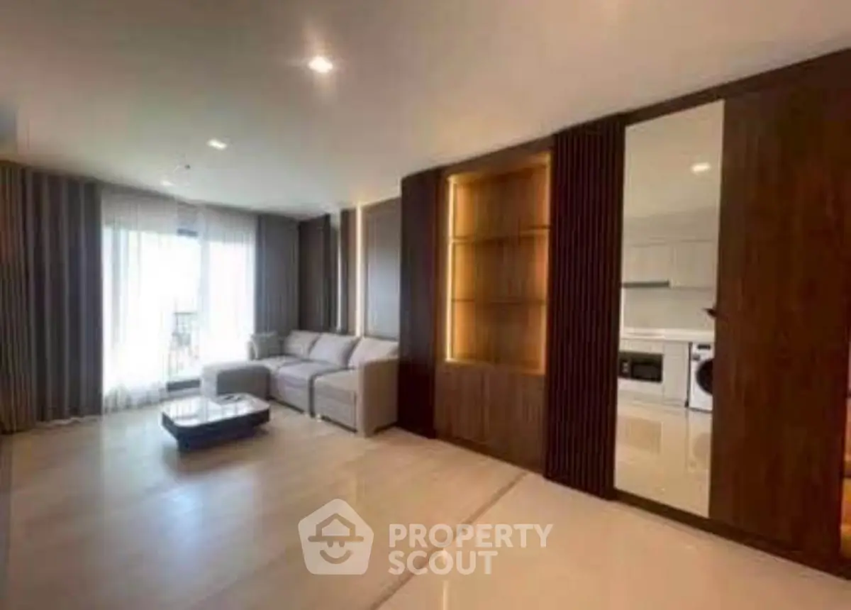 Spacious modern living room with elegant decor and natural light