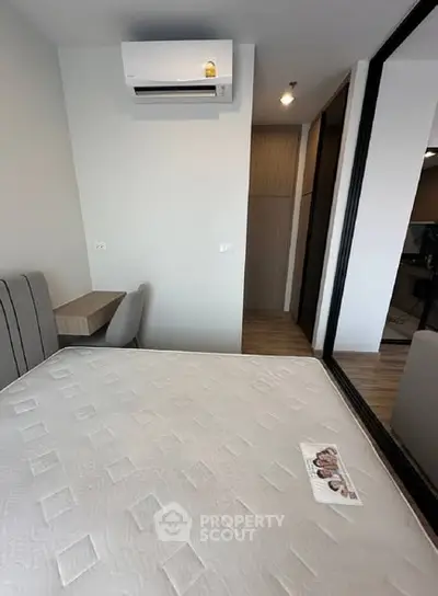 Modern bedroom with air conditioning and stylish decor