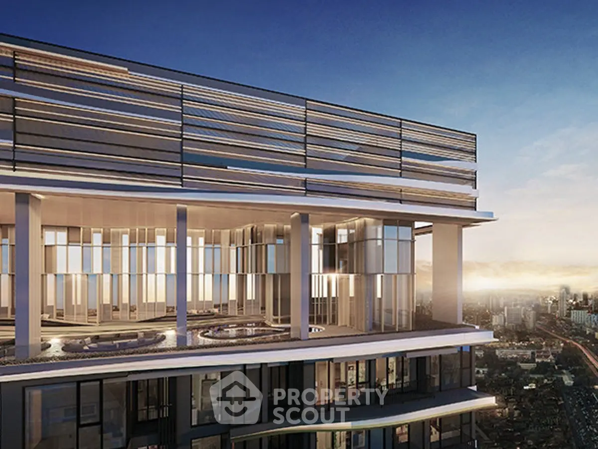 Stunning modern high-rise building with panoramic city views at sunset.