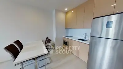 Modern kitchen with sleek cabinets and stainless steel appliances