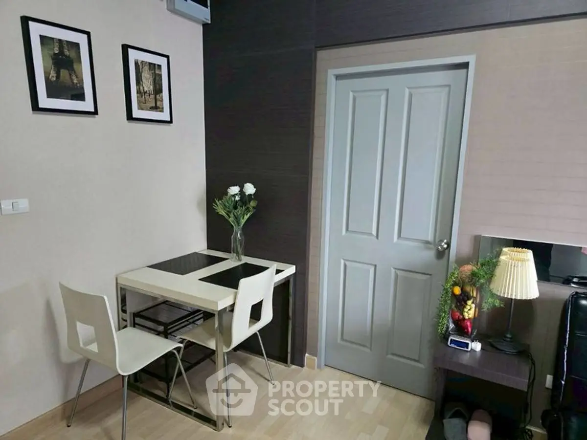 Cozy dining nook with modern decor and elegant table setting in stylish apartment.
