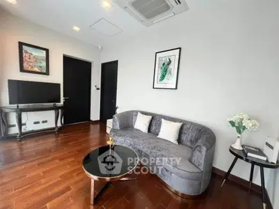 Stylish modern living room with elegant decor and wooden flooring