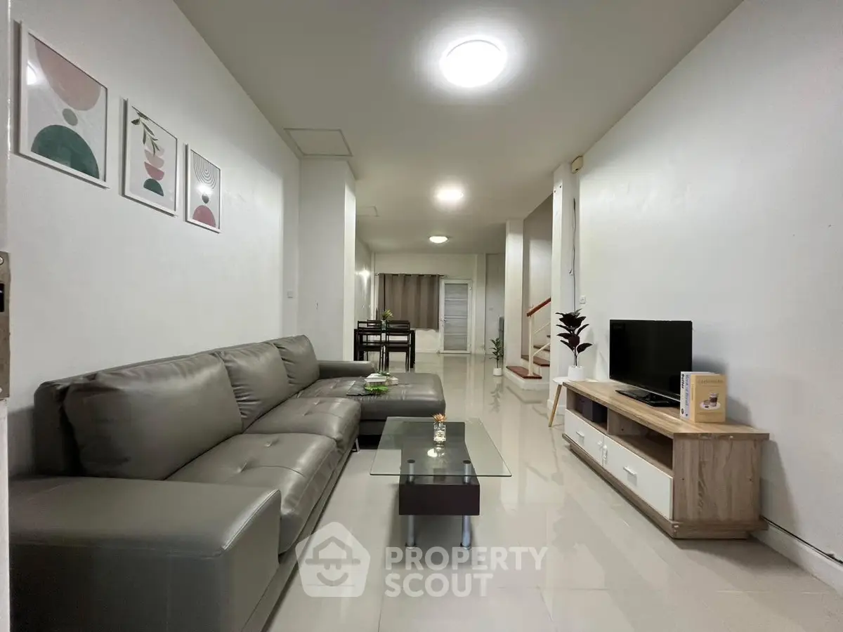 Spacious modern living room with sleek furniture and stylish decor