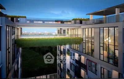 Stunning modern building with lush greenery and expansive city views.