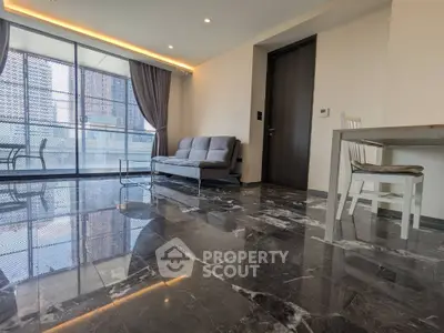 Spacious modern living room with marble flooring and large windows in urban apartment