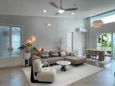 Spacious modern living room with elegant decor and natural light