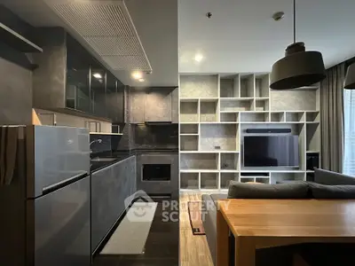 Modern open-layout kitchen and living room with sleek design and built-in shelving.