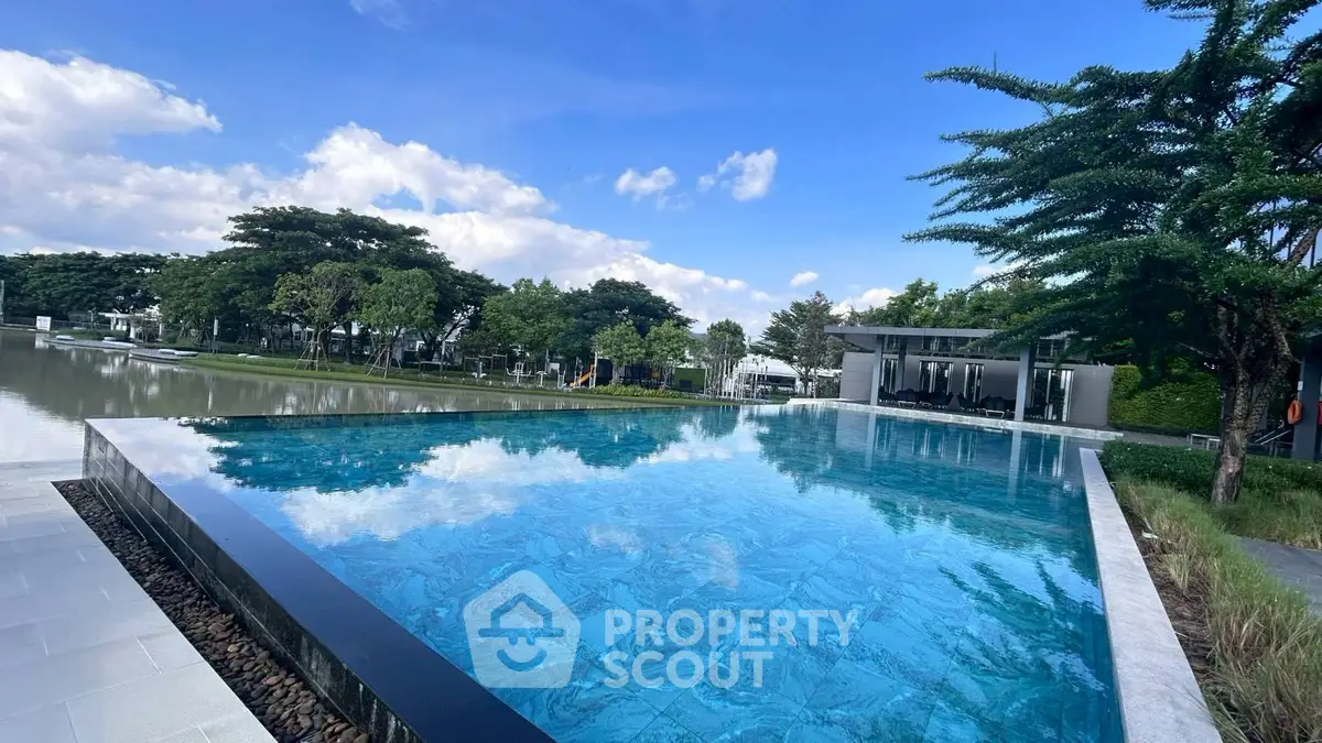Luxurious infinity pool with serene surroundings and lush greenery