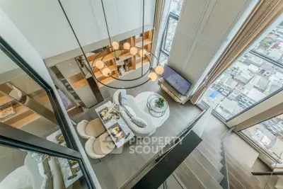 Luxurious modern living room with stunning city view and elegant decor