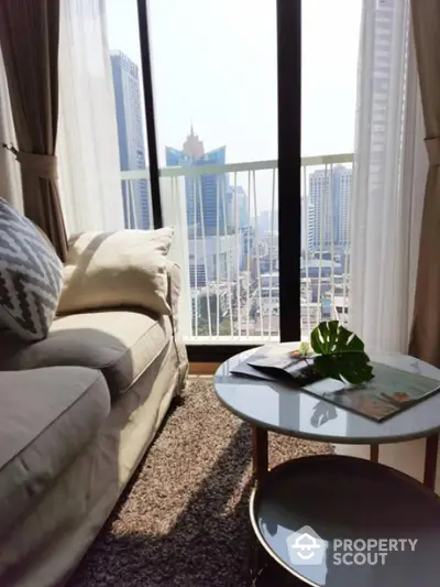 Modern living room with city view from a high-rise balcony, cozy sofa and stylish coffee table.