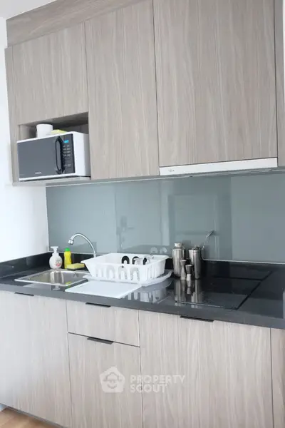 Modern kitchen with sleek design and integrated appliances