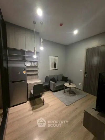 Modern compact living room with cozy sofa and stylish decor