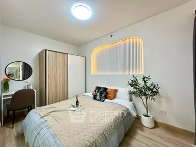 Modern bedroom with stylish decor and cozy ambiance, featuring a comfortable bed and elegant lighting.