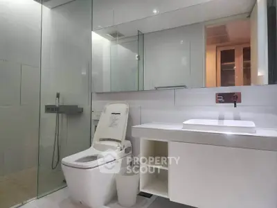 Modern bathroom with sleek design and glass shower enclosure