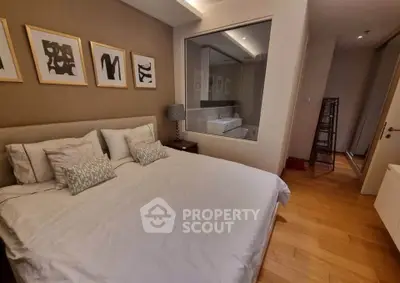 Luxurious bedroom with modern decor and ensuite bathroom view