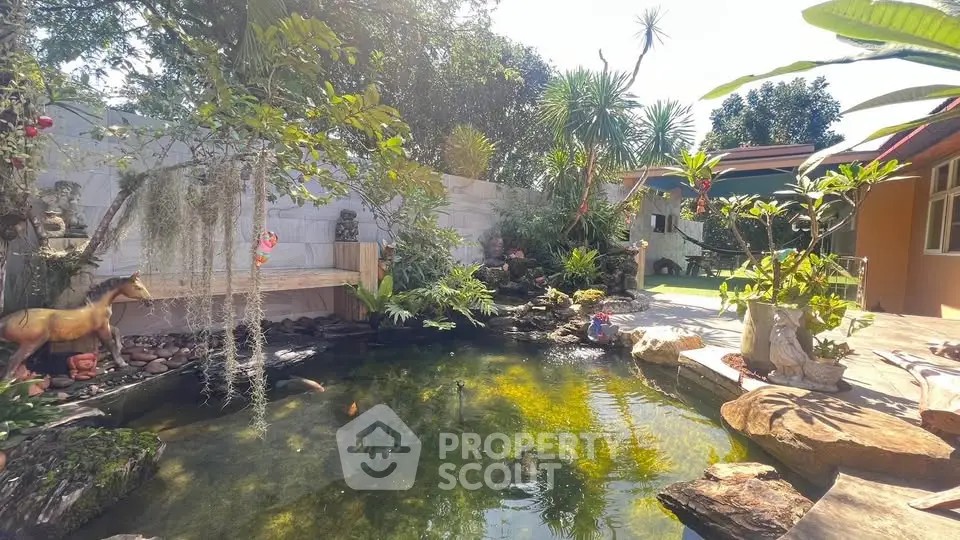 Stunning garden oasis with serene pond and lush greenery, perfect for relaxation and outdoor enjoyment.