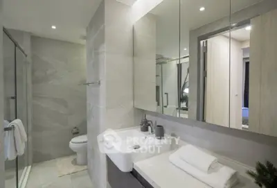 Modern bathroom with sleek design and spacious shower area