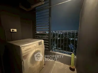 Chic urban balcony with city view and washing machine, perfect for modern living.