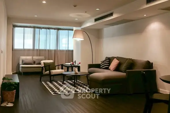 Spacious modern living room with cozy seating and stylish decor