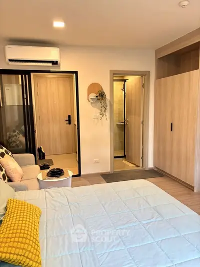 Modern bedroom with cozy decor and built-in wardrobe