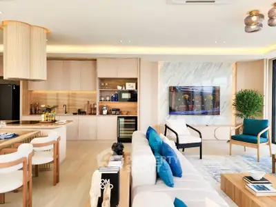 Luxurious modern living room with open kitchen, stylish decor, and natural light.