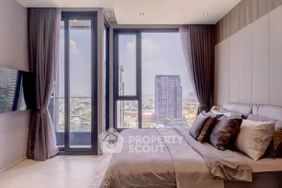 Luxurious bedroom with stunning city view and modern decor