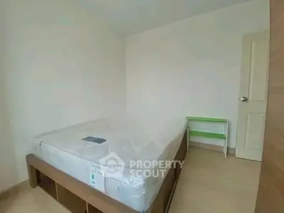 Cozy minimalist bedroom with new mattress and simple decor