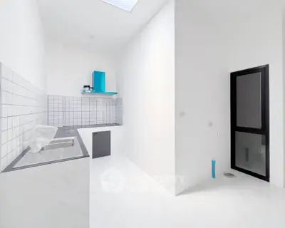 Sleek modern kitchen with minimalist design and bright natural lighting