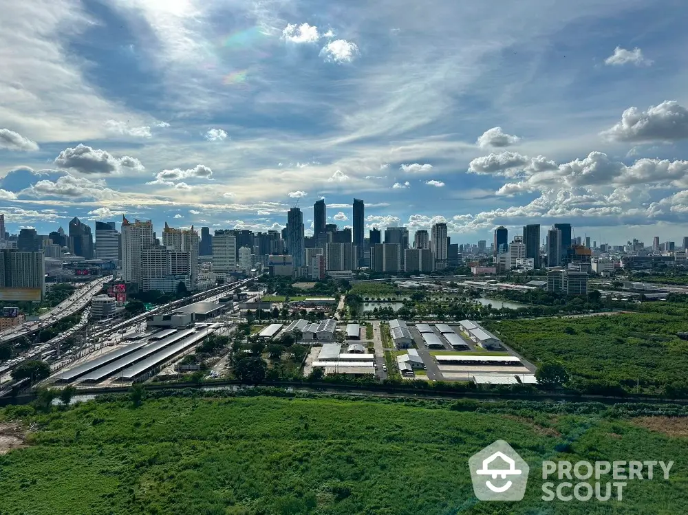 Stunning cityscape view with lush greenery and modern skyline, perfect for urban living enthusiasts.