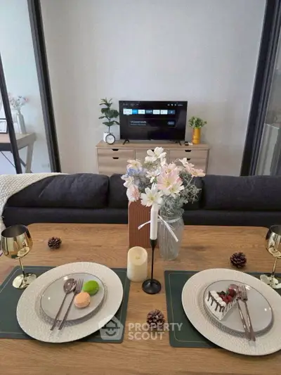 Stylish living room with elegant dining setup and modern decor