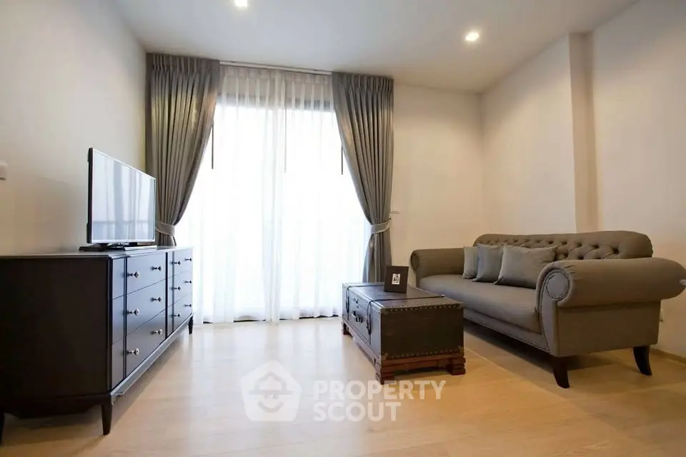 Elegant living room with stylish sofa and natural light