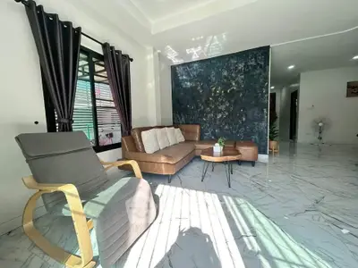 Spacious modern living room with stylish furniture and natural light
