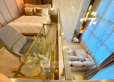 Luxurious modern loft with elegant bedroom and stylish living area, featuring floor-to-ceiling windows and chic decor.